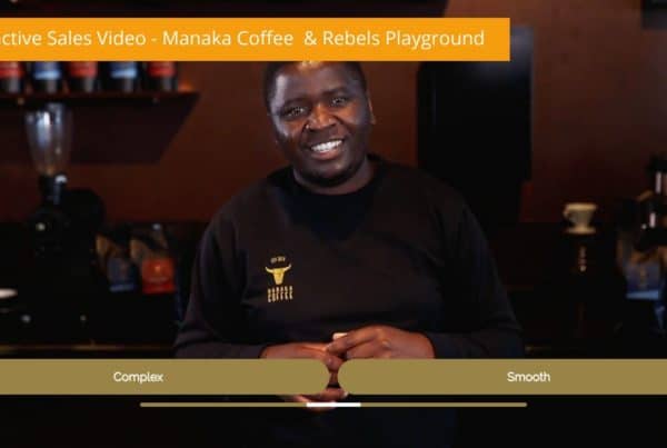 Interactive Sales Video - Freeze frame from a video where a man called Phumlani takes you on a journey to discover the Manake Coffee you should buy. Two options are shown on the screen: "complex" "smooth"