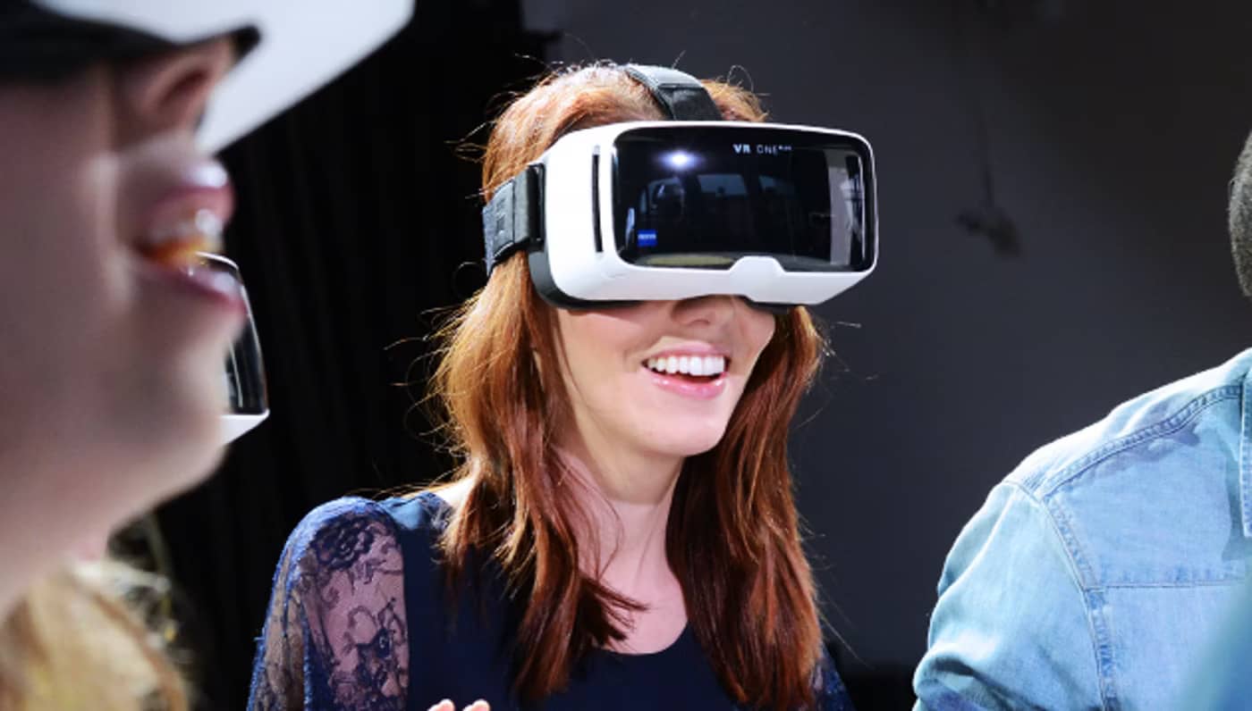 Woman wearing VR headset watching interactive 360 video