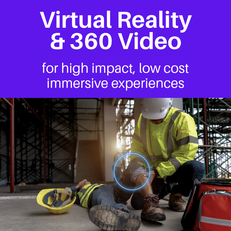 A construction worker wearing high-visibility gear kneels beside an injured colleague lying on the floor of an industrial site. The injured worker’s hard hat is on the ground, and the helper is examining their leg. The top of the image features text promoting virtual reality and 360-degree video for immersive, low-cost training experiences.