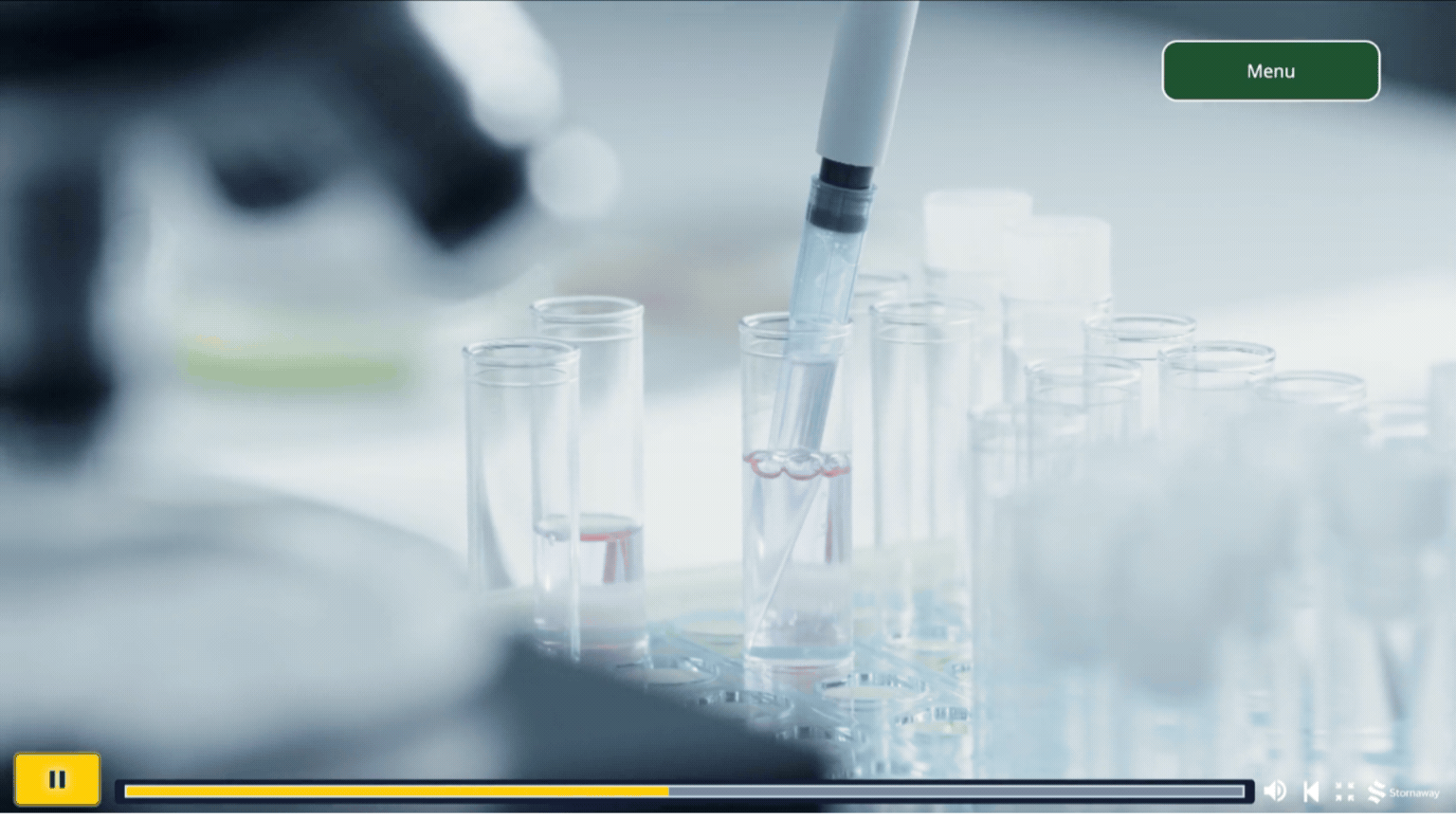 A virtual university campus tour pauses during a scene showing the science lab to give the viewer a fact about their impressive equipment. the video plays on after a click. this is a gif image.