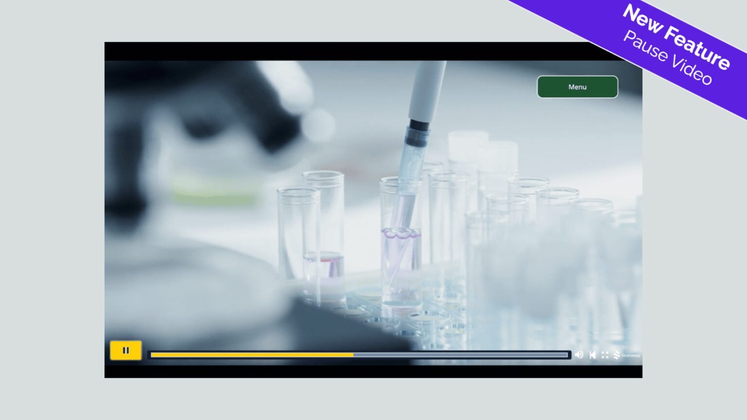 A virtual university campus tour pauses during a scene showing the science lab to give the viewer a fact about their impressive equipment. the video plays on after a click. this is a gif image.